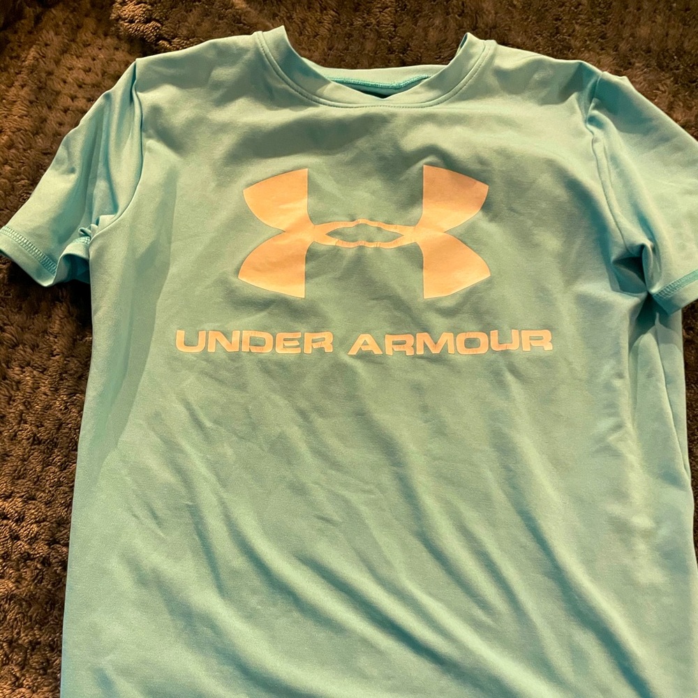 Boy’s light blue Under Armour shirt
